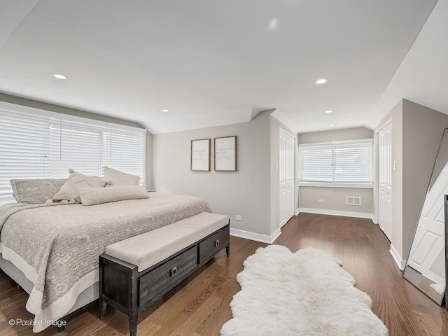 bedroom featuring baseboards, recessed lighting, and dark wood-style floors