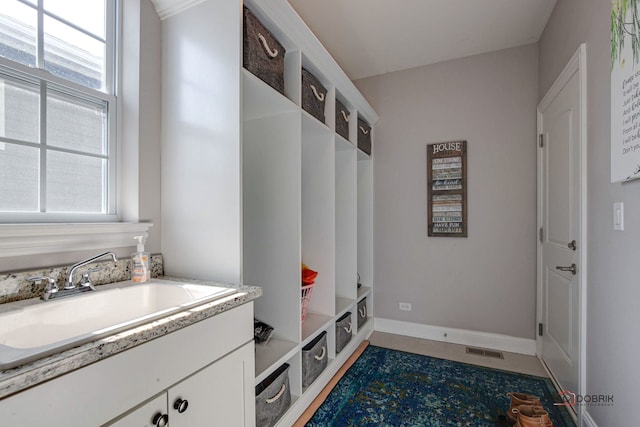 bedroom featuring visible vents, baseboards, recessed lighting, light colored carpet, and a raised ceiling