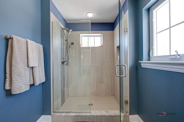 bedroom featuring carpet floors, ceiling fan, baseboards, and visible vents