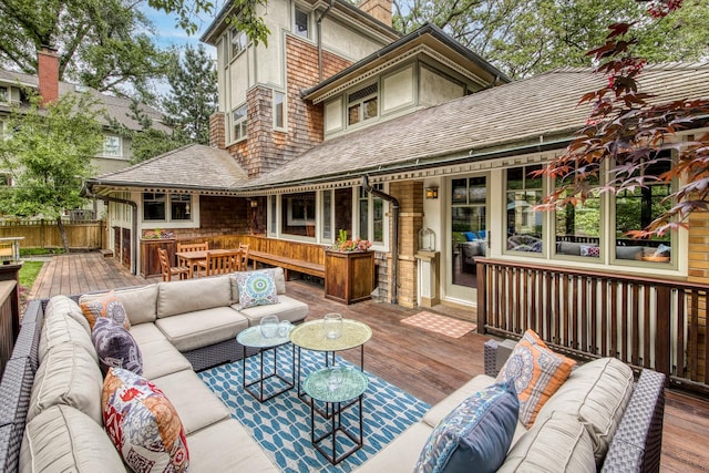 deck with an outdoor hangout area