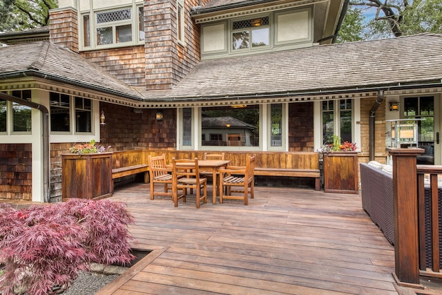 deck with outdoor dining space