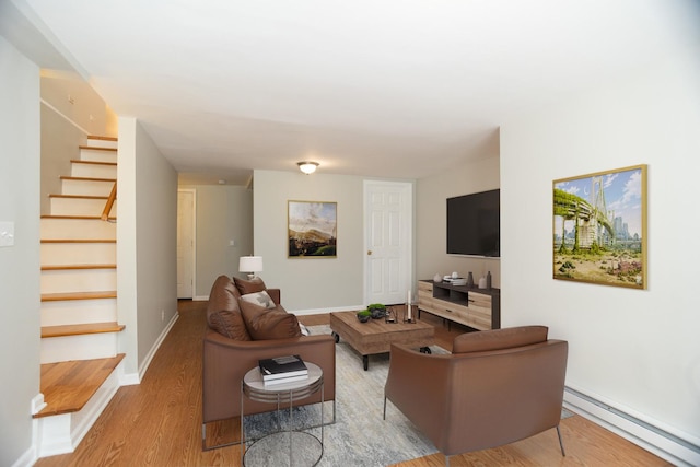 4830 N Albany Ave Unit 1N, Chicago, IL 60625 - living area with wood finished floors, baseboards, stairs, and a baseboard heating unit