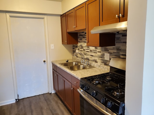 19135 Pine Dr Unit 2, Country Club Hills, IL 60478 - kitchen with backsplash, gas stove, light countertops, a sink, and under cabinet range hood