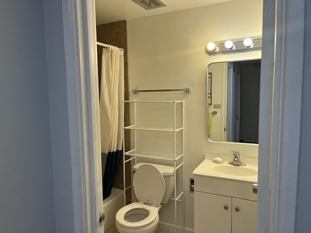 1428 E 55th St, Chicago, IL 60615 - bathroom featuring toilet, visible vents, shower / bath combination with curtain, and vanity