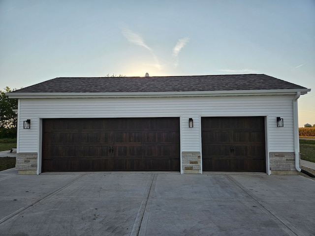 4150 W Church Rd, Beecher, IL 60401 - view of garage at dusk