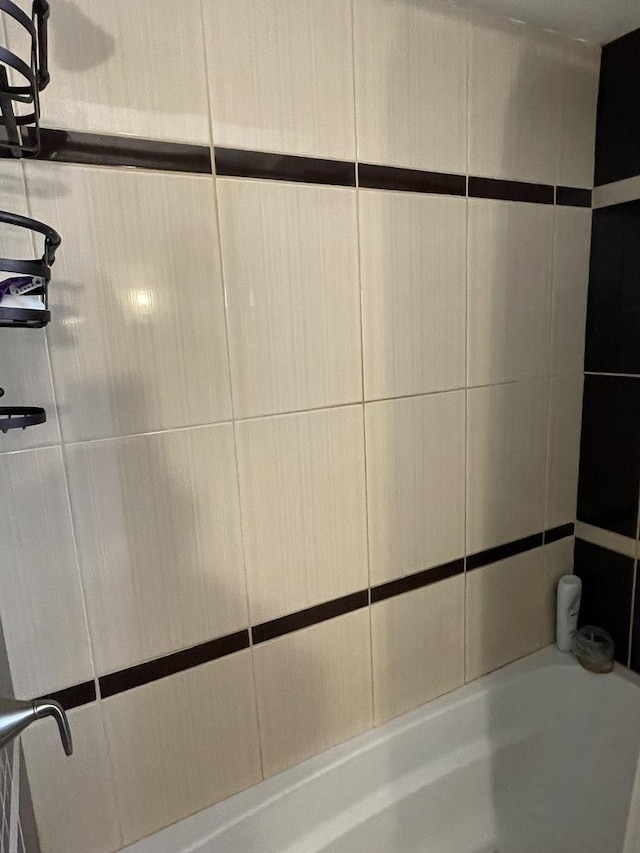 bathroom featuring bathing tub / shower combination