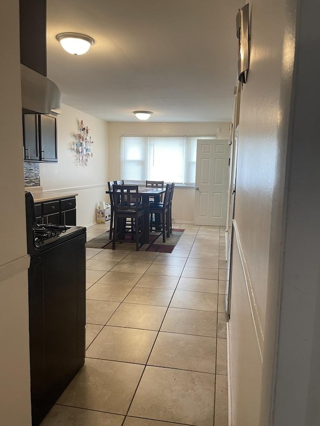 dining room featuring light tile patterned flooring