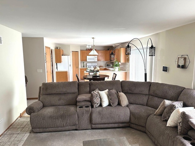 living room featuring visible vents