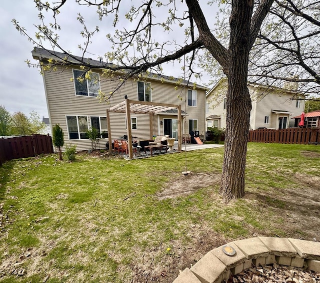 back of property with fence, a pergola, an outdoor living space, a patio area, and a lawn