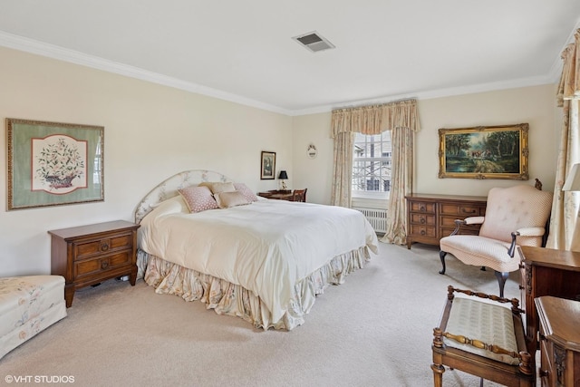 bedroom with carpet floors, ornamental molding, radiator, and visible vents