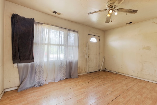 14533 Ashland Ave, Harvey, IL 60426 - spare room featuring ceiling fan, visible vents, and wood finished floors