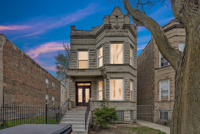 1516 S Homan Ave, Chicago, IL 60623 - view of front of home featuring fence and stone siding