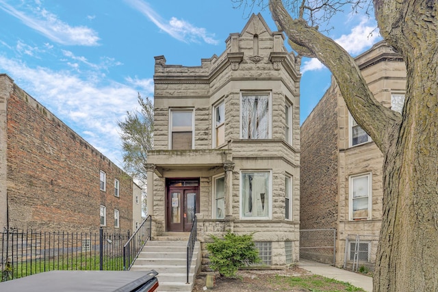 1516 S Homan Ave, Chicago, IL 60623 - view of front of house with fence and stone siding