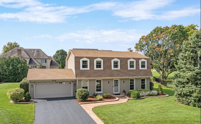 1938 Keim Dr, Wheaton, IL 60189 - colonial inspired home with a gambrel roof, a shingled roof, driveway, an attached garage, and a front yard