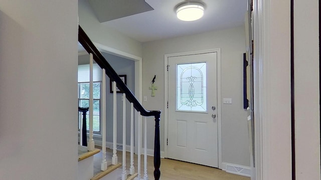 1938 Keim Dr, Wheaton, IL 60189 - foyer entrance featuring stairs, light wood-type flooring, and baseboards