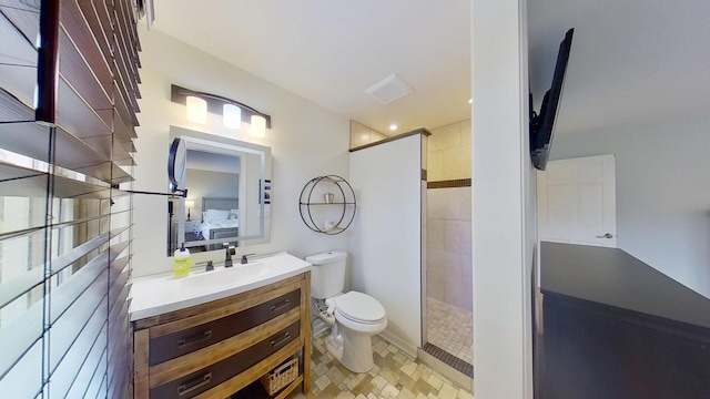 1938 Keim Dr, Wheaton, IL 60189 - bathroom featuring toilet, vanity, and a tile shower