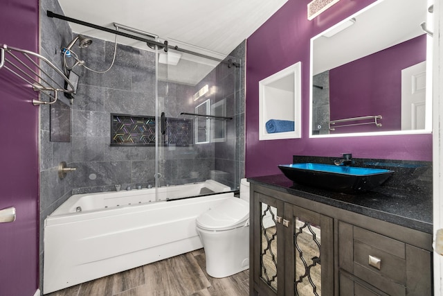 28W521 Donald Ave, West Chicago, IL 60185 - full bath featuring vanity, wood finished floors, and enclosed tub / shower combo