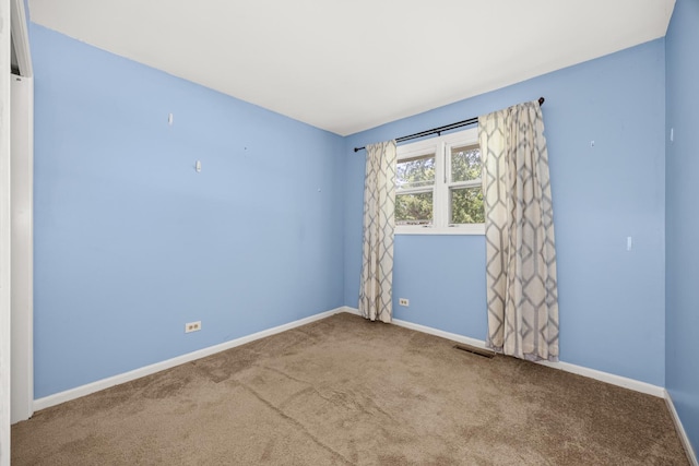 28W521 Donald Ave, West Chicago, IL 60185 - carpeted empty room featuring baseboards
