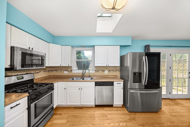 28W521 Donald Ave, West Chicago, IL 60185 - kitchen with stainless steel appliances, backsplash, and plenty of natural light