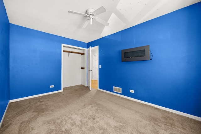 28W521 Donald Ave, West Chicago, IL 60185 - unfurnished bedroom featuring carpet floors, a closet, a ceiling fan, and vaulted ceiling