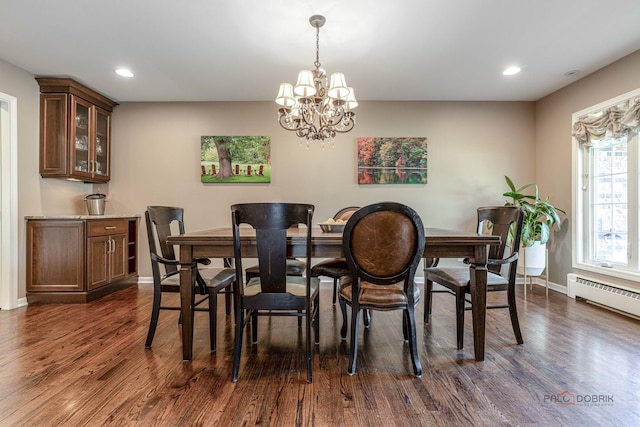 dining area with a chandelier, dark wood finished floors, baseboards, a baseboard heating unit, and recessed lighting