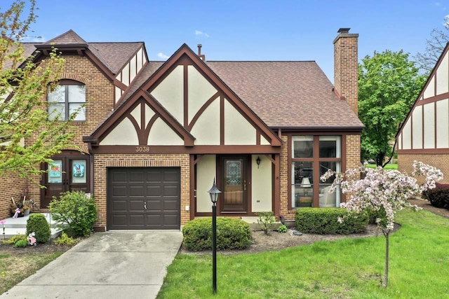 3038 Ashton Ct, Westchester, IL 60154 - english style home featuring brick siding, roof with shingles, stucco siding, and a chimney
