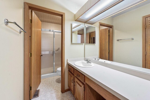 3038 Ashton Ct, Westchester, IL 60154 - full bathroom with vanity, tile patterned flooring, visible vents, toilet, and a stall shower