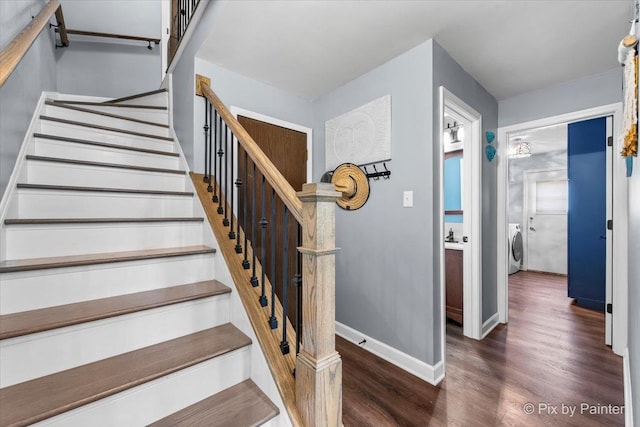 6561 Dunham Rd, Downers Grove, IL 60515 - staircase with wood finished floors, washer / clothes dryer, and baseboards