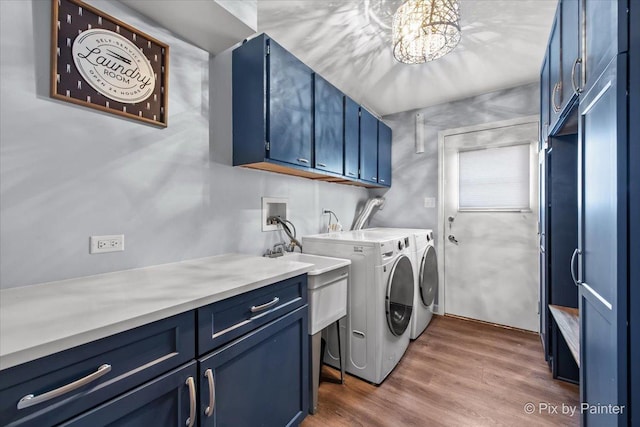 6561 Dunham Rd, Downers Grove, IL 60515 - laundry area with washer and dryer, cabinet space, dark wood-type flooring, and a chandelier