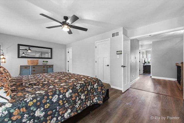 6561 Dunham Rd, Downers Grove, IL 60515 - bedroom featuring dark wood-type flooring, baseboards, and a ceiling fan
