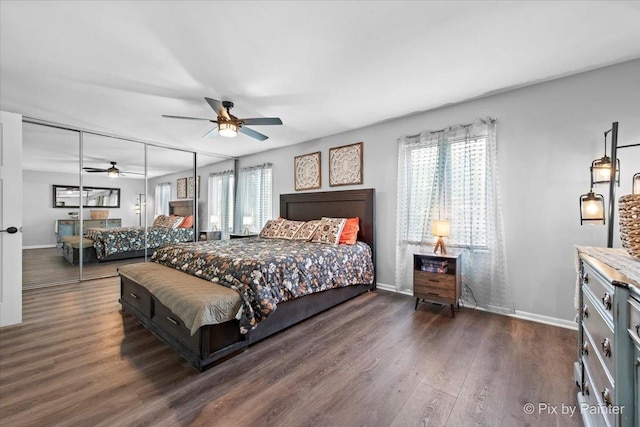 6561 Dunham Rd, Downers Grove, IL 60515 - bedroom with baseboards, dark wood-style floors, and ceiling fan