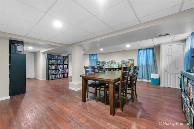 6561 Dunham Rd, Downers Grove, IL 60515 - dining room with wood finished floors, a paneled ceiling, and baseboards
