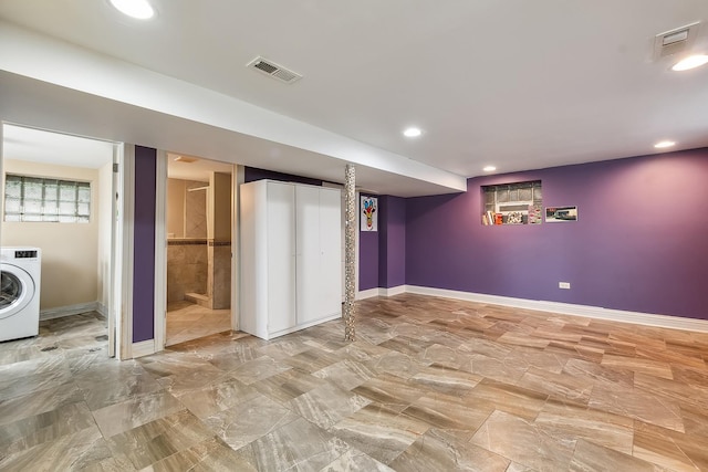 below grade area with washer / clothes dryer, recessed lighting, baseboards, and visible vents