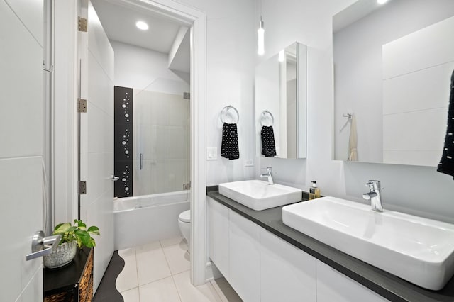 2424 W Chicago Ave Unit 203, Chicago, IL 60622 - full bath with toilet, combined bath / shower with glass door, a sink, and tile patterned flooring