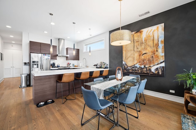 2424 W Chicago Ave Unit 203, Chicago, IL 60622 - dining space featuring recessed lighting, baseboards, and light wood-type flooring