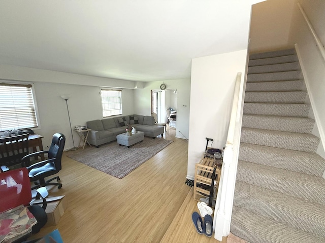 353 S Whispering Hills Dr Unit C, Naperville, IL 60540 - living area featuring light wood finished floors and stairway
