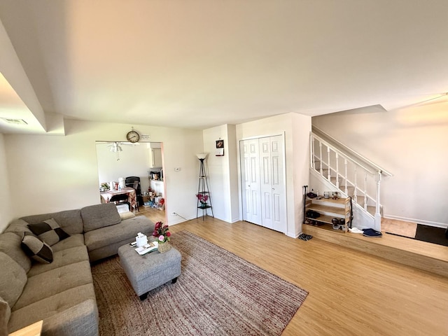353 S Whispering Hills Dr Unit C, Naperville, IL 60540 - living area with stairs, baseboards, and wood finished floors