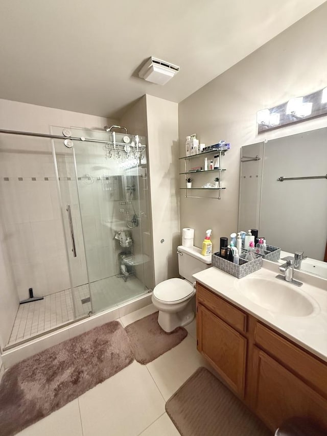 353 S Whispering Hills Dr Unit C, Naperville, IL 60540 - full bathroom featuring tile patterned floors, vanity, a stall shower, and toilet