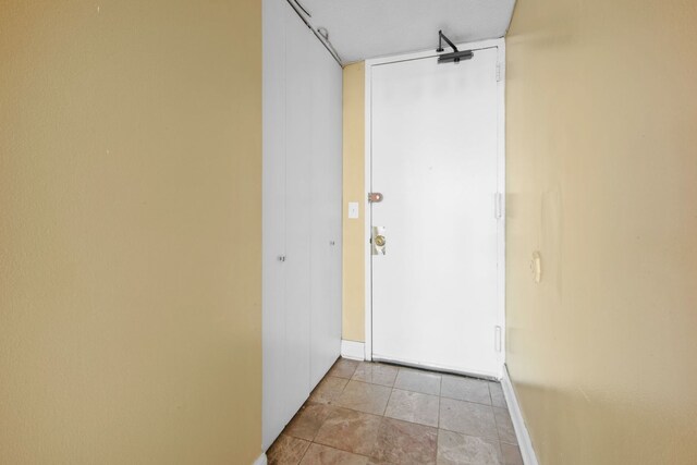 6700 S S Shore Dr Unit 10J, Chicago, IL 60649 - hallway with baseboards