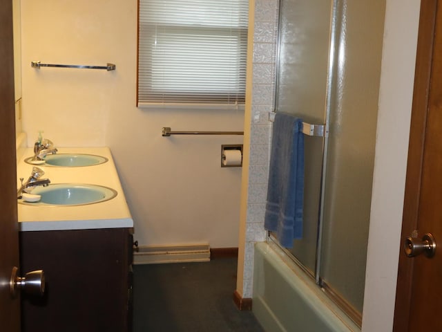 1605 Sharon Rd, Streator, IL 61364 - full bath featuring a sink, baseboards, double vanity, and shower / bath combination with glass door