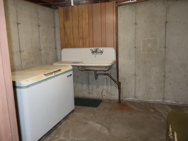 1605 Sharon Rd, Streator, IL 61364 - unfinished basement featuring a sink and refrigerator