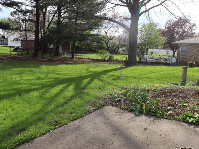 1605 Sharon Rd, Streator, IL 61364 - view of yard featuring fence and a patio
