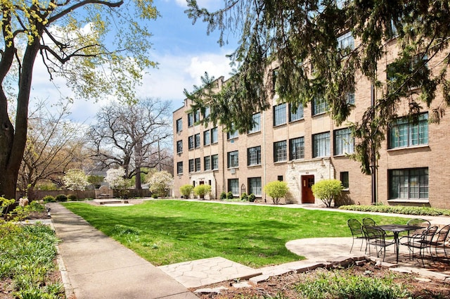 surrounding community with a lawn