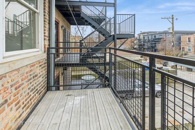 balcony featuring stairs