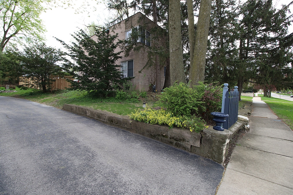 view of side of home with fence
