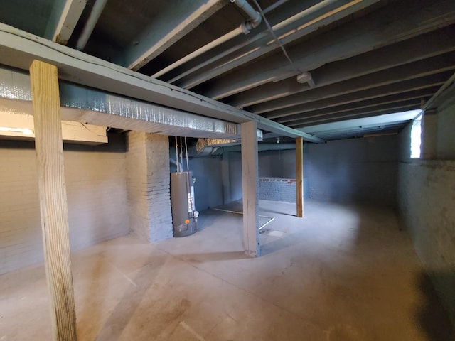 below grade area featuring gas water heater