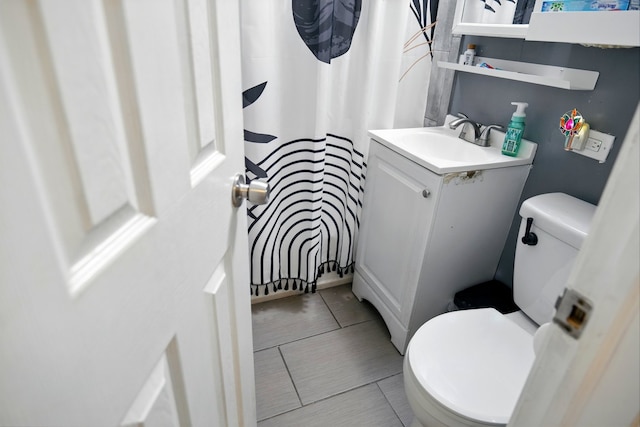 8801 S Kilbourn Ave, Hometown, IL 60456 - bathroom with vanity, tile patterned flooring, toilet, and a shower with shower curtain
