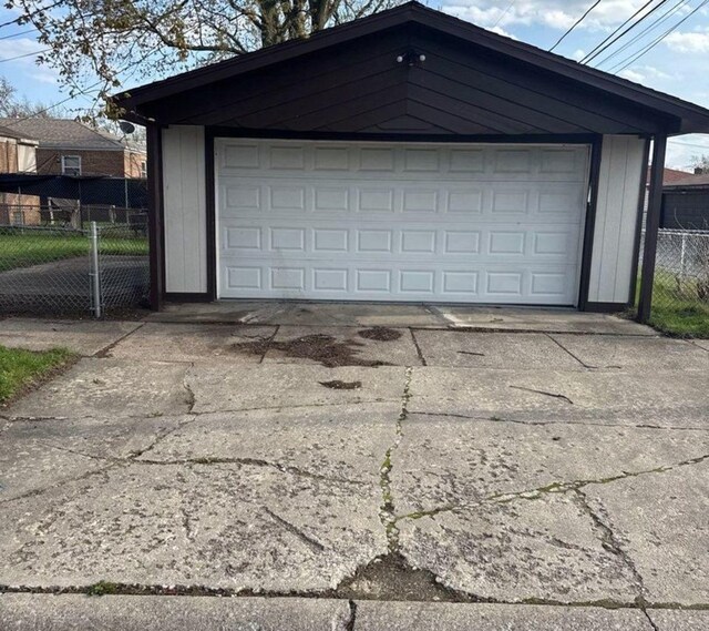 garage with fence