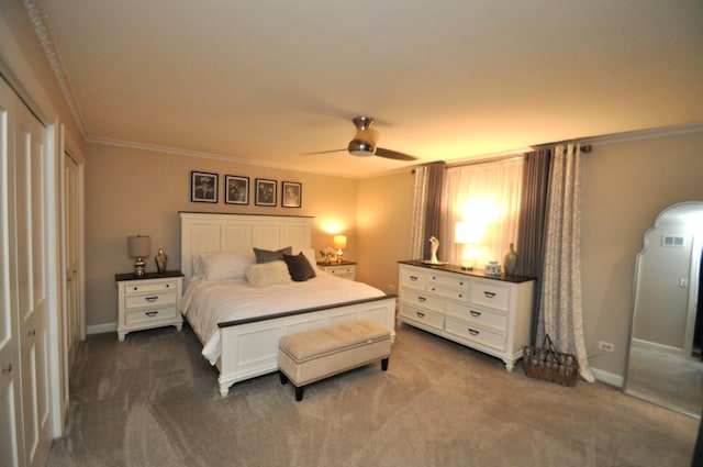 bedroom with baseboards, ornamental molding, and dark carpet