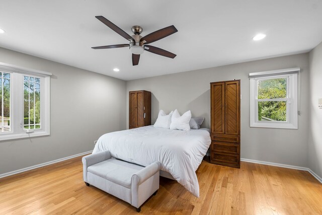 3130 Kayjay Dr, Northbrook, IL 60062 - bedroom with light wood finished floors, multiple windows, baseboards, and recessed lighting